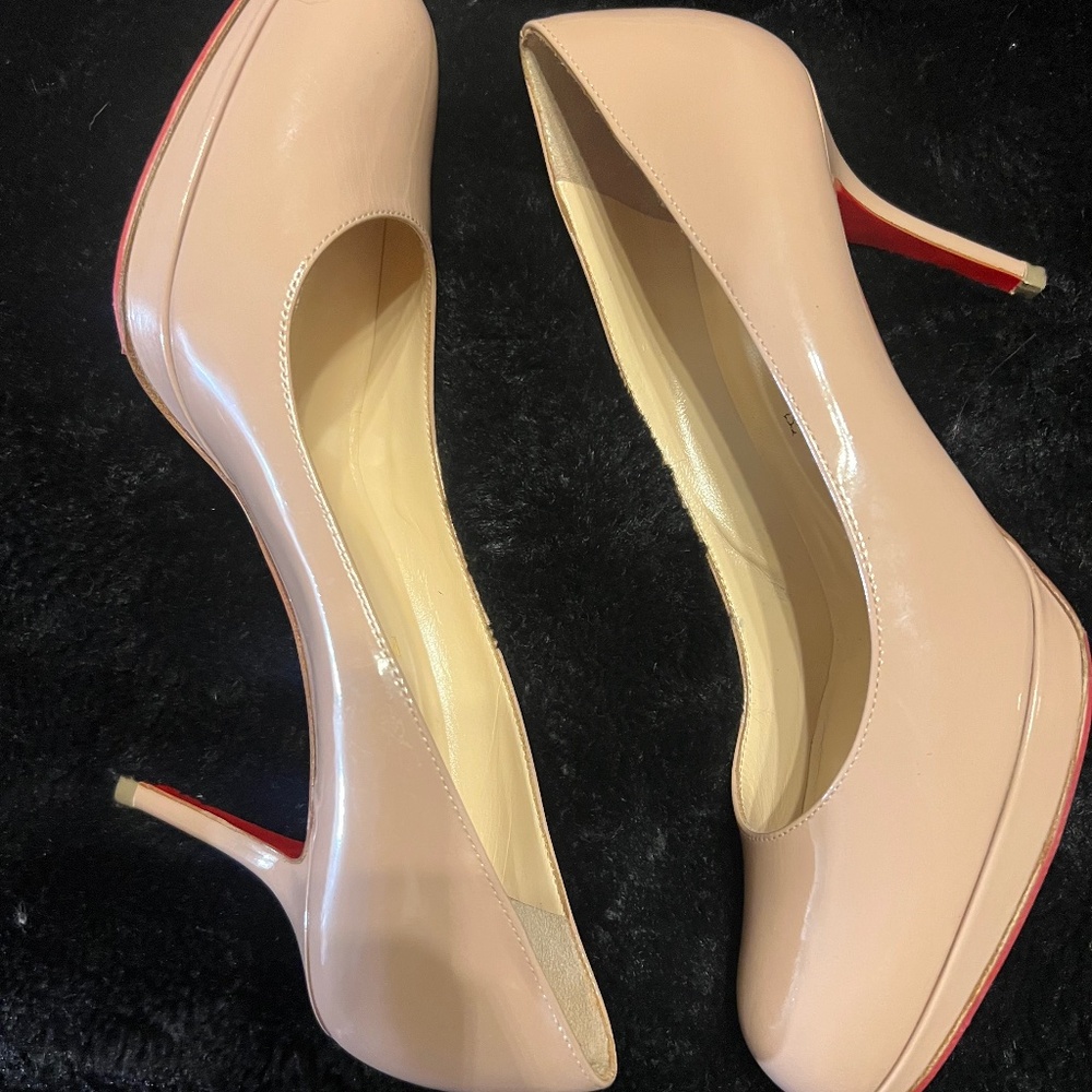 Nude Christian Louboutin heels
